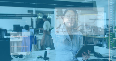Image of data processing over asian businesswoman using tablet in office. Global business and...