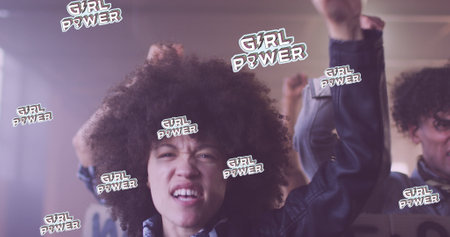 Image of girl power girl text over diverse group of people with banners. National women's equality day concept digitally generated image.の写真素材