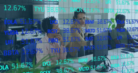 Image of data processing over diverse business people talking in office. Global business and digital interface concept digitally generated image.の写真素材