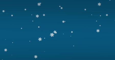 Digital image of snowflakes icons falling against copy space on blue background. Christmas festivity and celebration conceptの写真素材