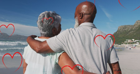 Image of falling hearts over african american couple. International day of older persons concept...