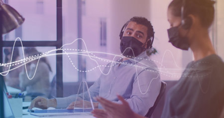 Image of data processing with white lines over diverse business people with face masks. Global...