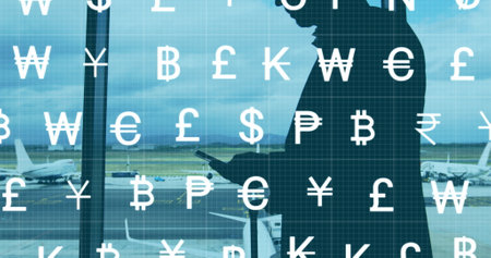 Image of currency symbols over caucasian businessman at airport. Global business and digital interface concept digitally generated image.の写真素材