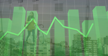 Image of finacial data processing over muslim women with bike cityscape. Global business, finances, data processing and digital interface concept digitally generated image.の写真素材