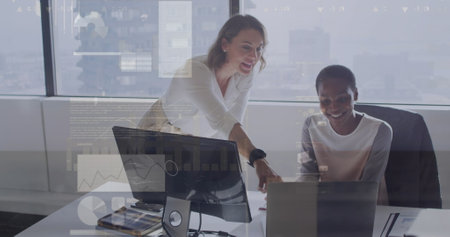 Image of online using laptop and bitcoin icons over woman using laptop. global business connections digital interface and technology concept digitally generated image.の写真素材