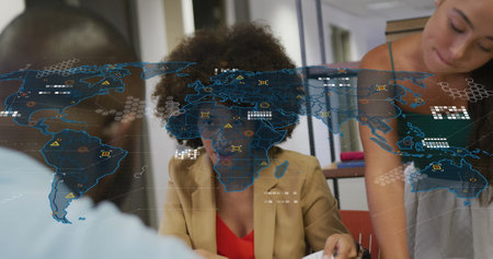 Image of world map over diverse business people in office. Global business and digital interface...