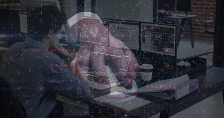Image of data processing over caucasian businessman using computer. Computer security day and...