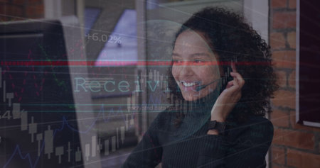 Image of data processing over businesswoman using phone headset. Global business and digital interface concept digitally generated image.の写真素材