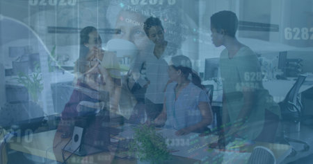 Image of financial data and graphs over diverse coworkers in office. Business, finance, economy, communication and cooperation concept digitally generated image.の写真素材
