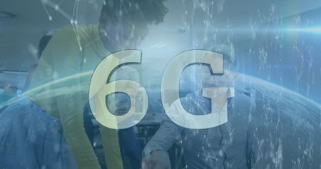 Image of connections and g6 over diverse coworkers in office. Business, finance, economy, communication and cooperation concept digitally generated image.の写真素材