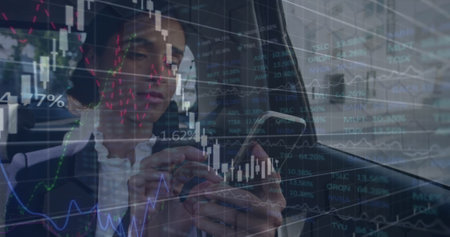 Image of data processing over caucasian businesswoman using smartphone. Global business and digital interface concept digitally generated image.の写真素材