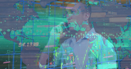 Image of data processing over caucasian businessman talking on smartphone. Global business and...