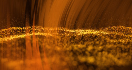 Image of orange light over undulating golden particles on black background. Communication technology, abstract digital interface background concept digitally generated image.の写真素材