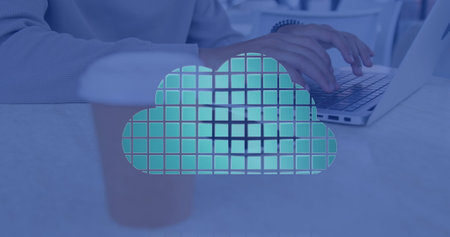 Image of clouds with shapes over hands using laptop. Global business and digital interface concept...