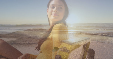 Image of happy caucasian woman in car over seascape. Holidays, vacations and relax concept digitally generated image.の写真素材