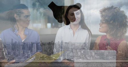 Image of diverse successful businesspeople in office over cityscape. Global business, cooperation and working in office concept digitally generated image.の写真素材