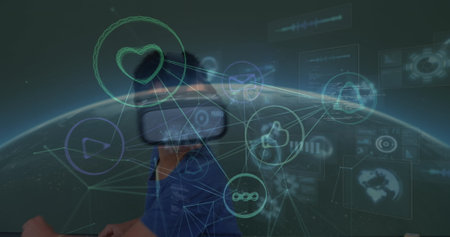 Image of connected icons, codes, globe over caucasian boy playing while using vr headset. Digital...