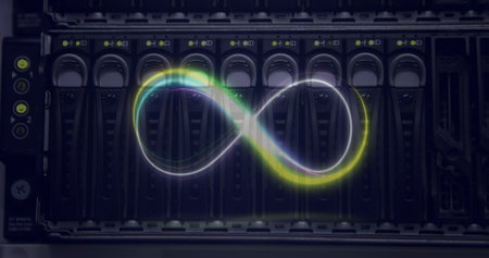 Image of neon infinity over servers. Digital screen, interface and technology concept digitally generated image.の写真素材