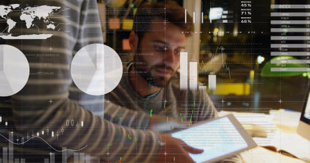 Image of statistics and financial data processing over caucasian businessman in office. Global business, data processing and digital interface concept digitally generated image.の写真素材