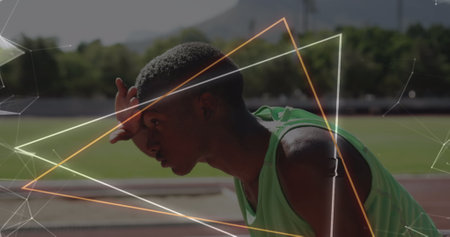 Image of hexagons and triangles over african american man tired after run. Global network, sport and active lifestyle concept digitally generated image.の写真素材