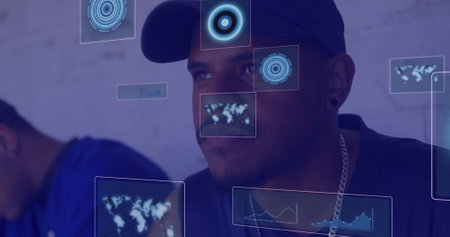 Image of data processing over african american man sitting. Global business and digital interface...