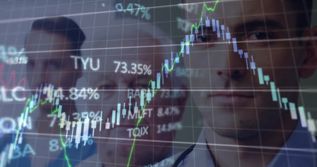 Image of financial graphs and data over caucasian male doctors looking at camera. Health, medicine...