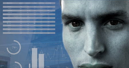 Image of statistics and financial data processing over caucasian man. Global business, connections, networks and data processing concept digitally generated image.の写真素材