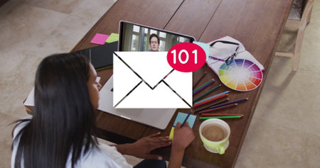 Image of email icon with numbers over caucasian woman on laptop image call. Global social media, business, technology, data processing and digital interface concept digitally generated image.の写真素材
