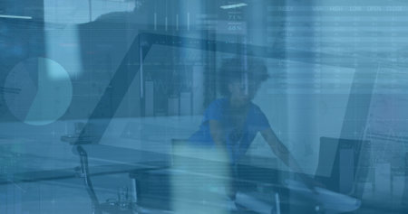 Image of financial data processing over african american businesswoman. Global business, communication, digital interface and data processing concept digitally generated image.の写真素材