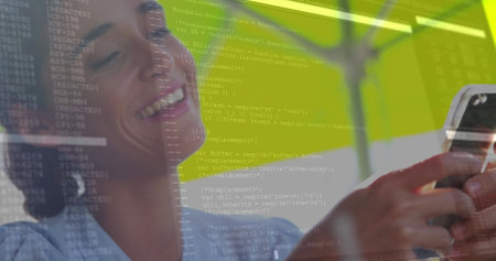 Image of lines and data processing over hands of caucasian woman using smartphone. Data processing, communication and technology devices concept digitally generated image.の写真素材