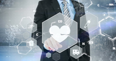 Businessman in suit and tie interacting with floating medical hexagons in office, with heart icon. Technology, healthcare, innovation, augmented reality, digital interface, corporate, medical symbolsの写真素材