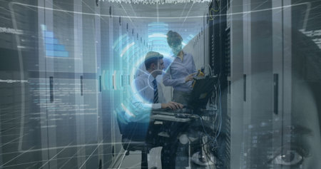 IT professionals typing and examining network cables in data center aisle, with network graphics....