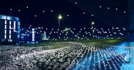 Displaying floating data over overnight highway under overpass, with streetlights and lit buildings. Urban, futurism, technology, nightscape, data visualization, modern, landscapeの写真素材