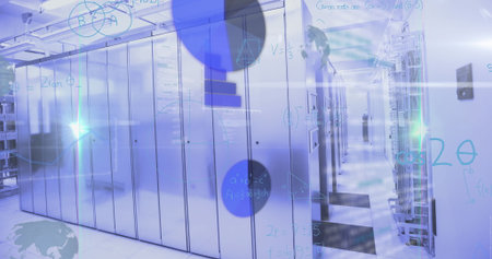 Featuring cable trays above server racks lining data center corridor with patch cables. Technology,...