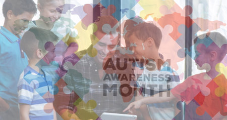 Guiding teacher in checked shirt holding tablet engaging children at school with autism theme. Education, collaboration, diversity, learning, interaction, development, curiosityの写真素材