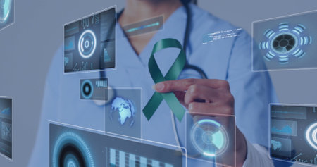Showing medical worker in scrubs holding green awareness ribbon in clinic, with panels. Healthcare,...