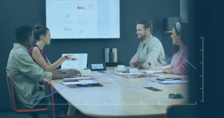 Business team analyzing sales data on chart display in meeting room, with reports and coffee cups....