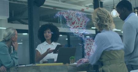 Collaborating professionals gesturing toward rotating globe hologram at office table, with tablet. Innovation, teamwork, technology, brainstorming, modern, business, dataの写真素材