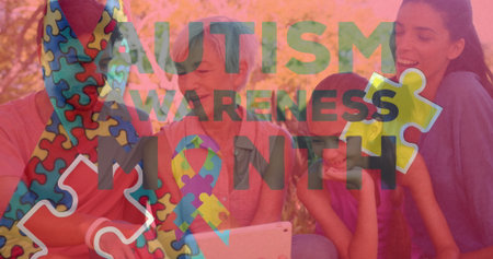 Sitting three-generation family examining tablet in park, with puzzle piece cutouts, ribbon symbol. Family, multigeneration, outdoor, leisure, community, unity, diversityの写真素材