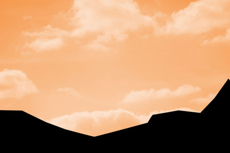 Flat design silhouetted angular rooftops are stretching under glowing orange sky with soft clouds. Dusk, landscape, minimalism, natural, tranquility, warm, horizonの写真素材