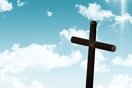 Dark brown wooden cross is standing in flat design against vibrant sky with rope and clouds. Spiritual, serenity, nature, tranquility, rustic, inspiration, minimalistの写真素材