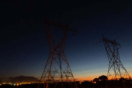 The evening electricity pylon silhouetteの写真素材
