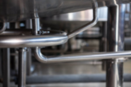 Close-up of pipes at distilleryの写真素材