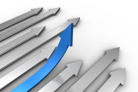 Blue arrow pointing up from grey arrowsの写真素材