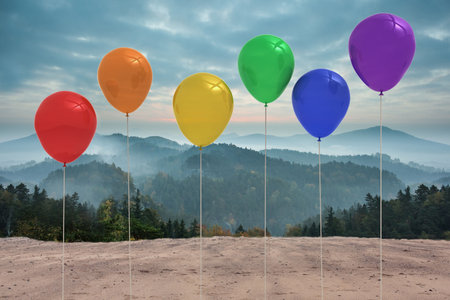 Balloons in front of mountainsの写真素材