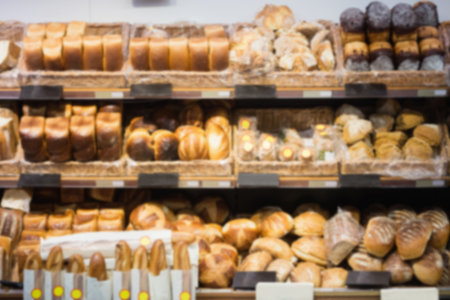 Varieties of bread in wooden crates for sale at supermarket