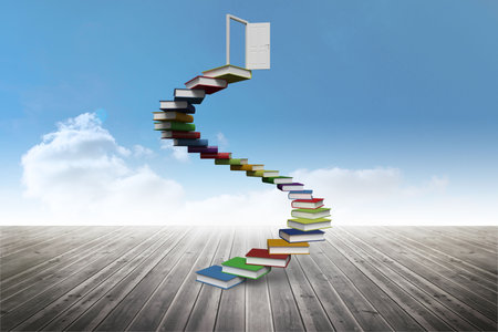 Book steps leading to open door against skyの写真素材