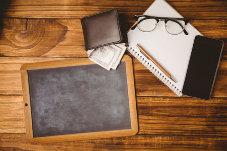 Flat design is showing top-down chalkboard left, wallet, notebook, pencil, eyeglasses, phone....