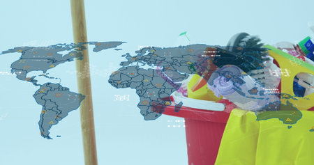 Showing red bucket holding cleaning tools and broom in studio with map overlay, copy space....