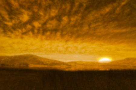 Scenic view of sunset over landscapeの写真素材